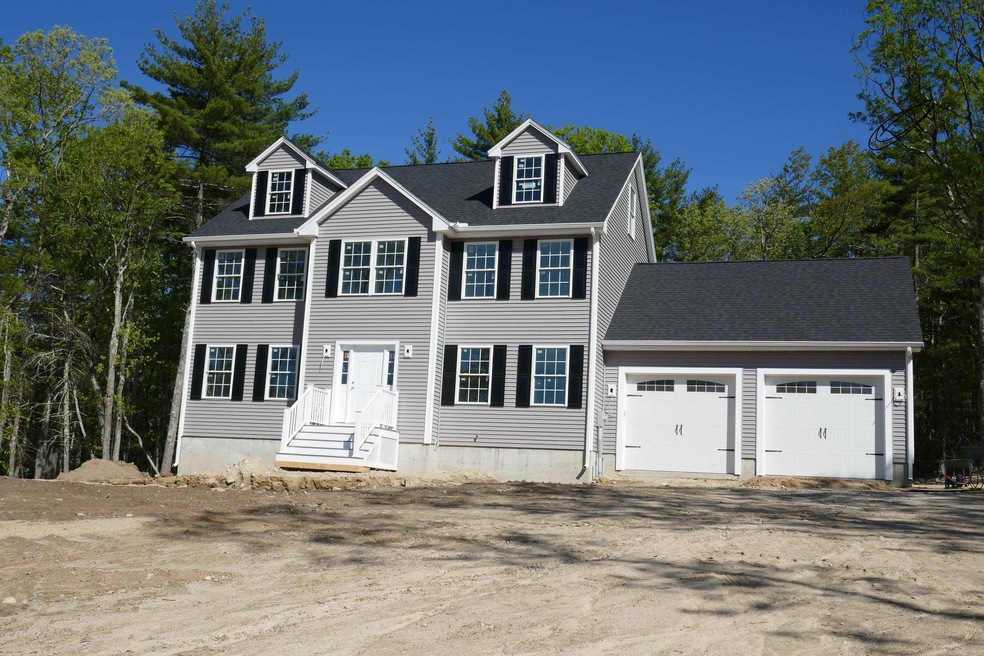 Stately colonial with beautiful front lawn coming 
