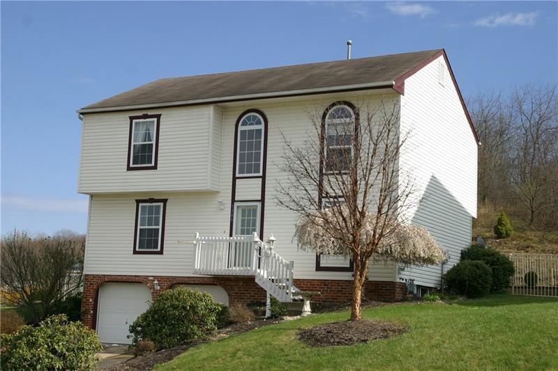 Welcome to 1203 Sandstone Ct E, a lovely two story