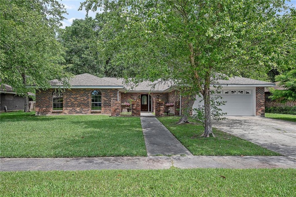 Front View Brick Exterior with large courtyard ent