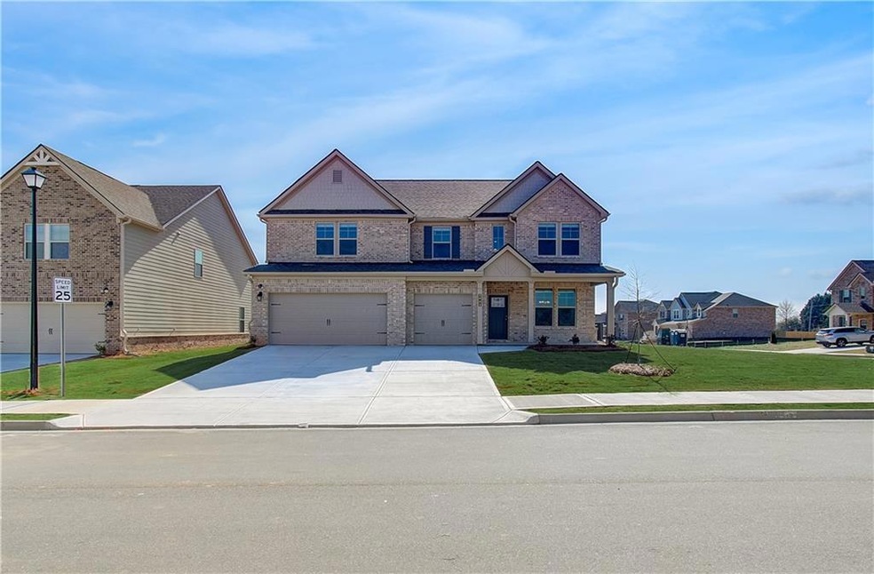 Craftsman-style home featuring a front yard and a 