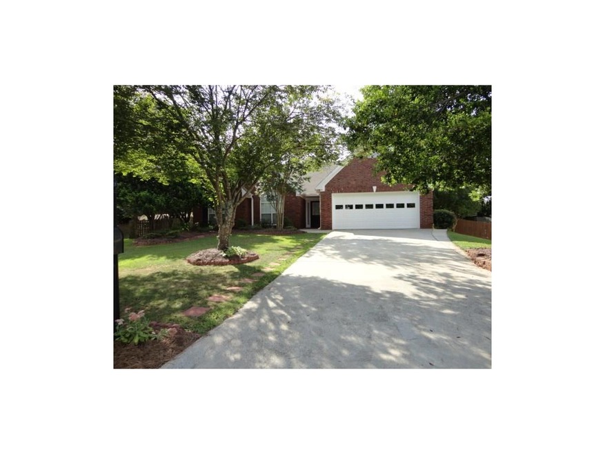 Meticulously maintained ranch home with 2 car gara