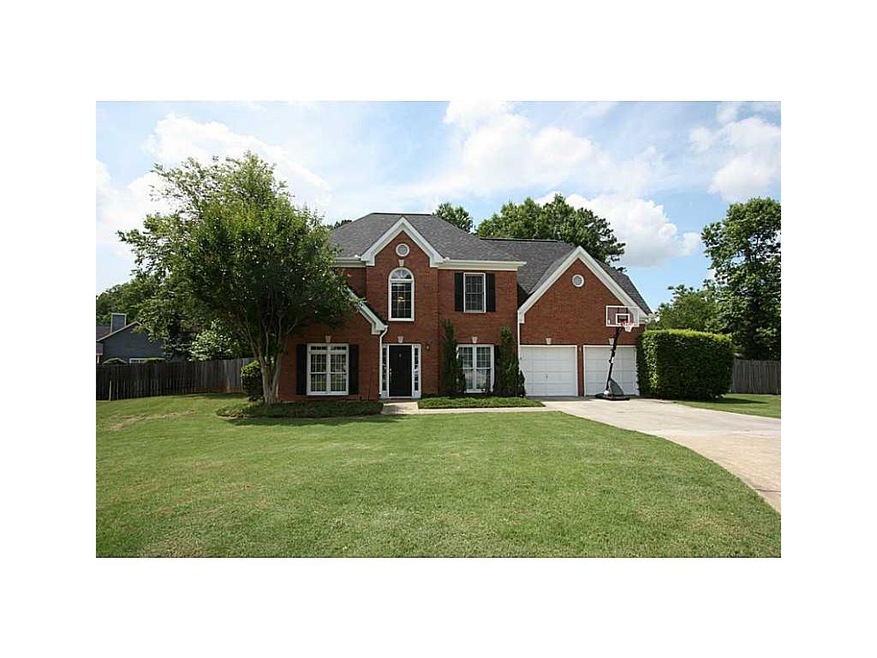 Exterior Front. Brick front with cement fiber boar