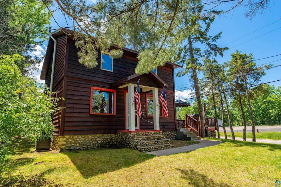 View of front of property with a front lawn
