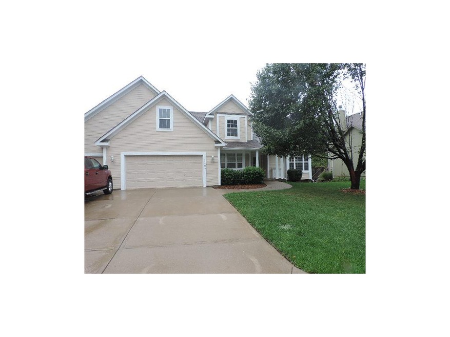 Front of the home with three car garage