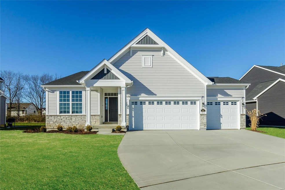 Front Elevation with Stone Facade and Vinyl Siding