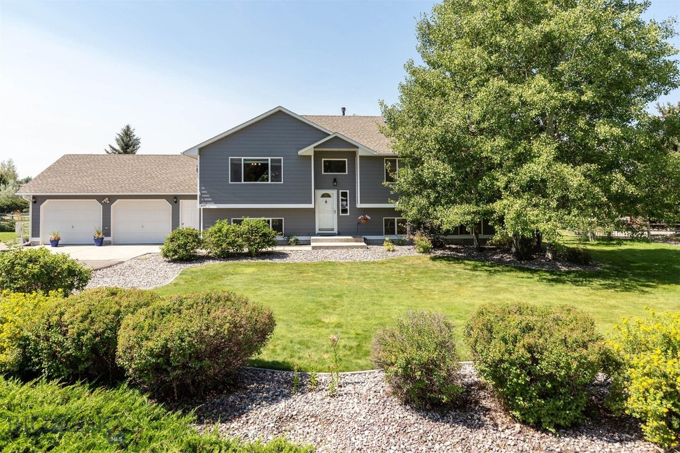 Gorgeous front yard with a beautiful variety of pl