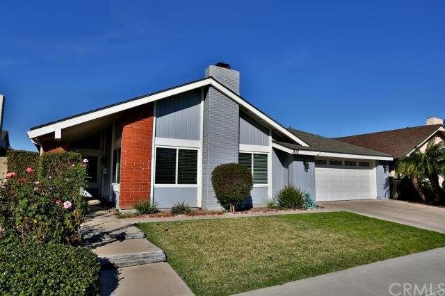 Front of the Home.  Long Driveway leading into the