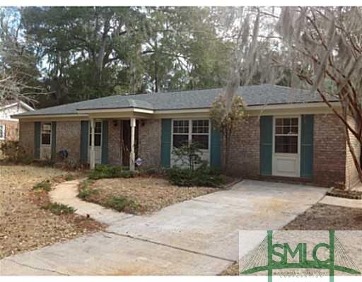 Exterior Front. Large lot with Privacy fence on De
