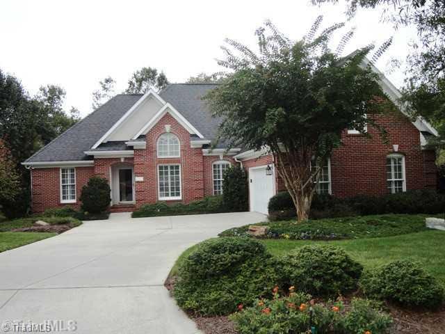 Exterior Front. Custom brick home with wonderful landscaping
