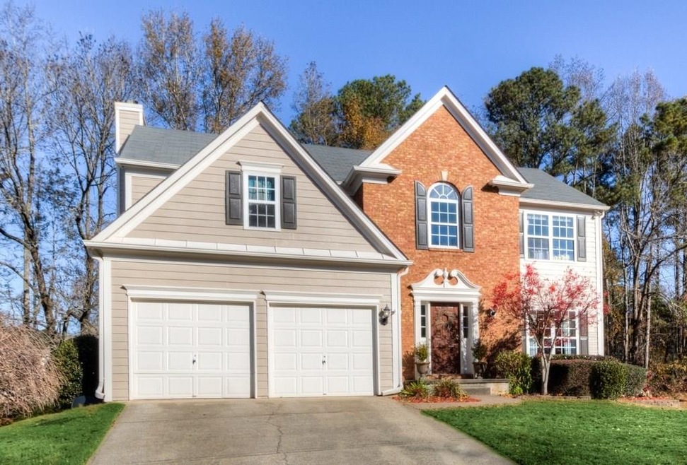 Wonderful curb appeal!  Brick and cement siding.  