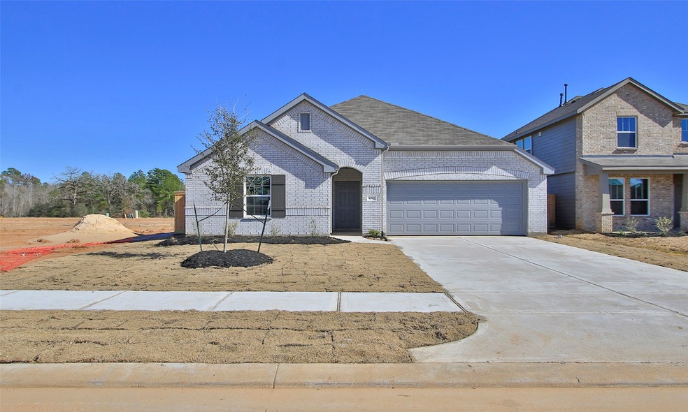 4047 Colony River Rock Blvd, Pinehurst, TX 77362 - photo 1