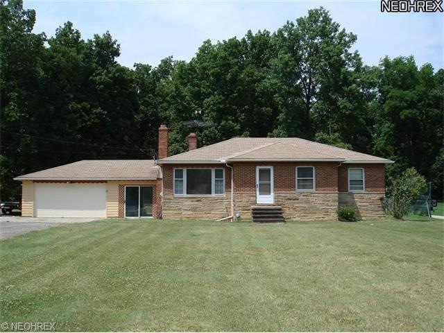 GORGEOUS HOME ON ALMOST AN ACRE.  BEAUTIFUL BACK AND FRONT YARDS.  BREEZEWAY WITH SLIDER TO PATIO.  FULL BASEMENT