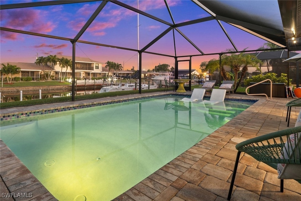Sailboat Access canal with a newer pool and loungi
