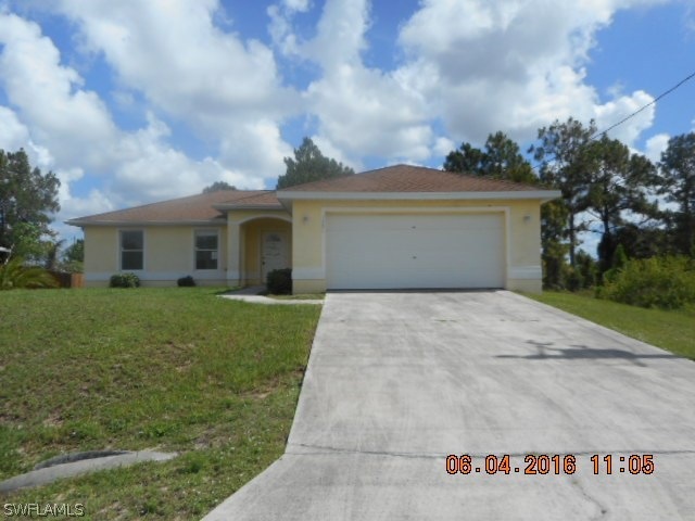 1251 Earnest St E, Lehigh Acres, FL 33974 - photo 1