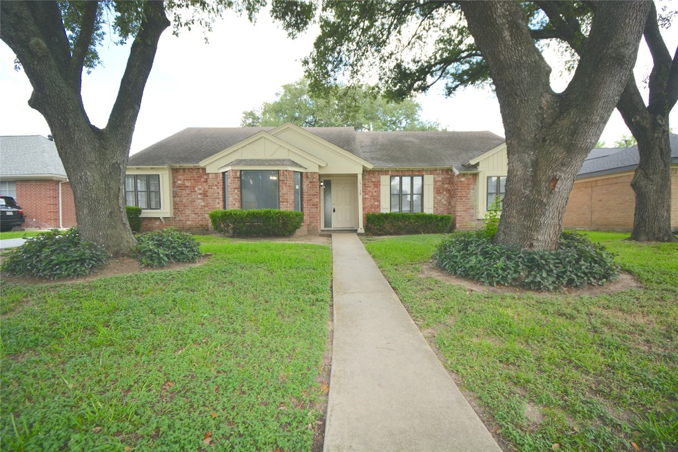 Front view of this charming home nestled in establ