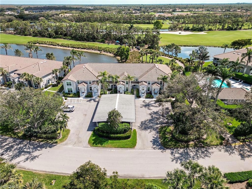 Bird's eye view featuring a water view, a resident
