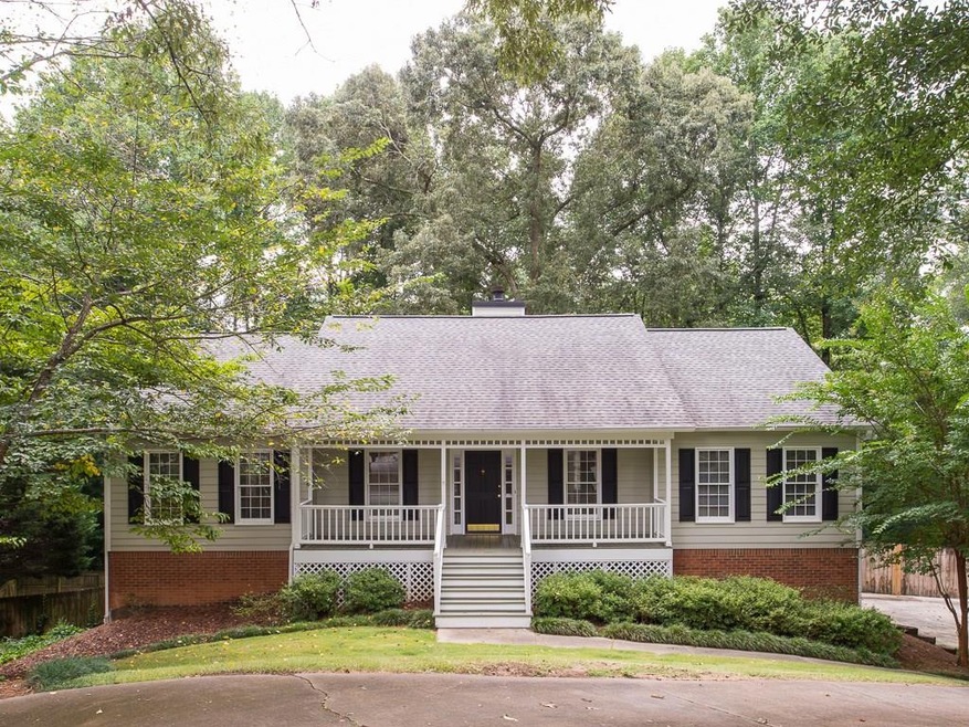 So charming with rocking chair front porch at end 