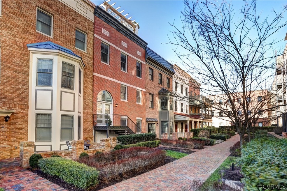 Enter your new townhome from this lovely courtyard