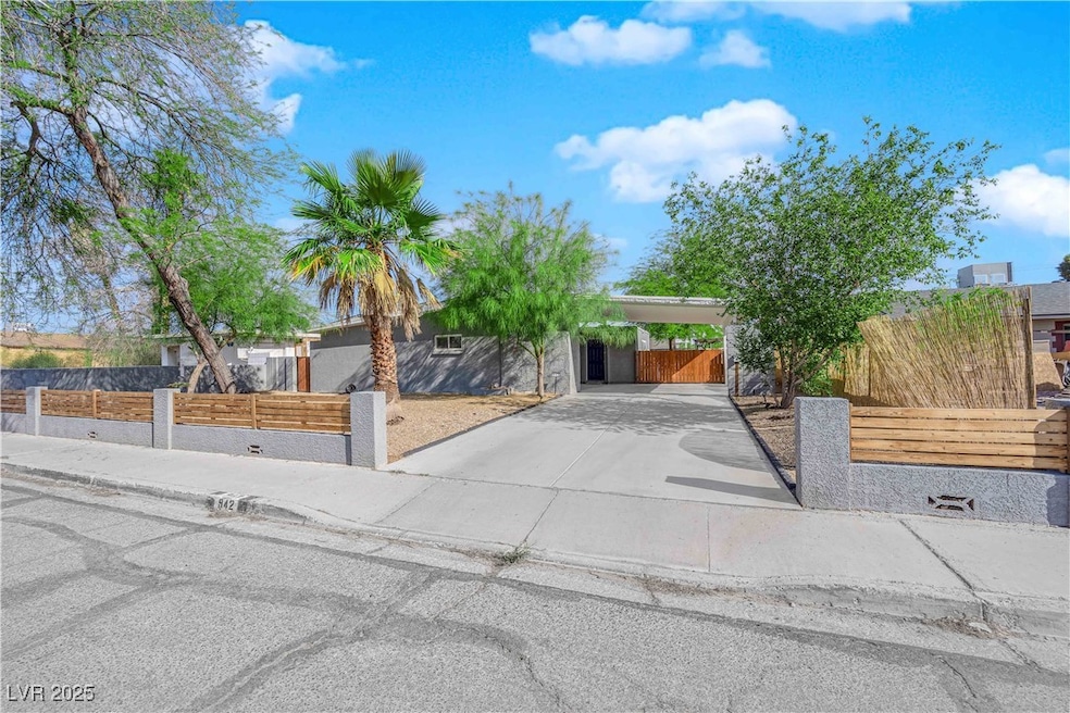 View of property hidden behind natural elements wi