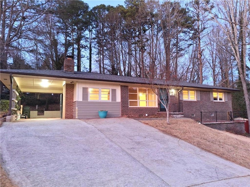 Ranch-style house with a carport