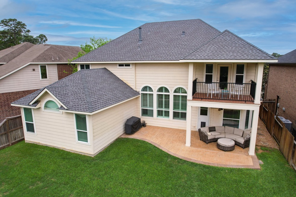 Discover your dream home's inviting backyard, feat