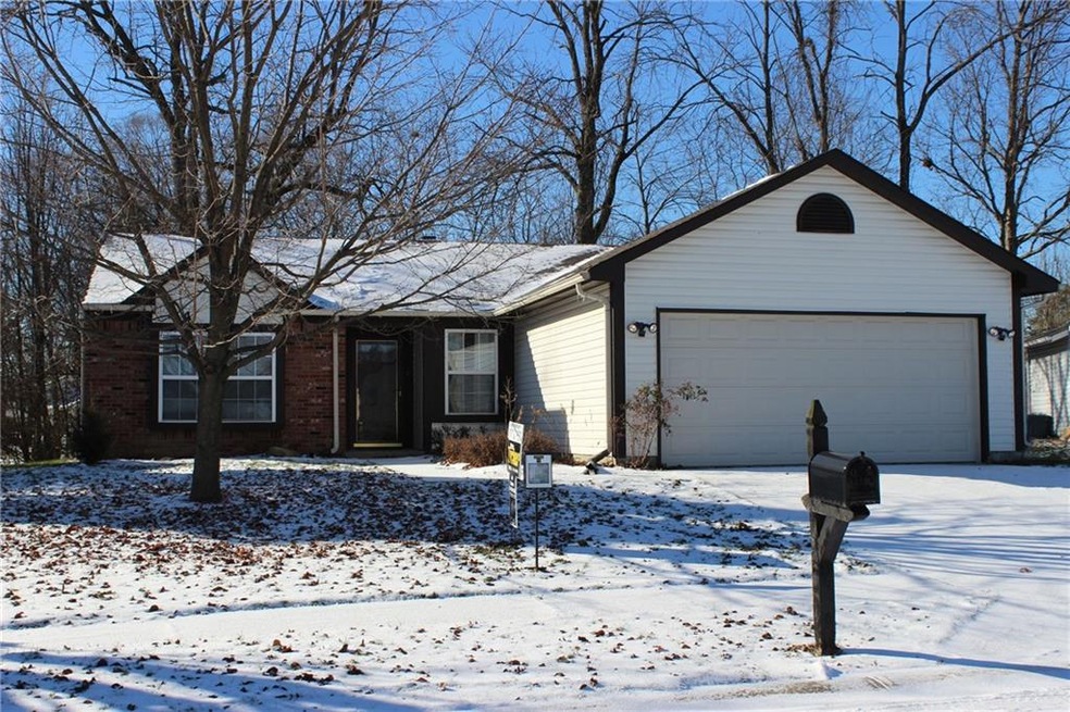 Welcome home to 10039 Lone Wolf Dr. This beautiful home is move in ready and is nestled on almost .25 acres with a wooded tree line, creek and pond behind. Close to Pendleton Pike, 56th St., downtown Indy and I-465, it's easy access to shopping, rest