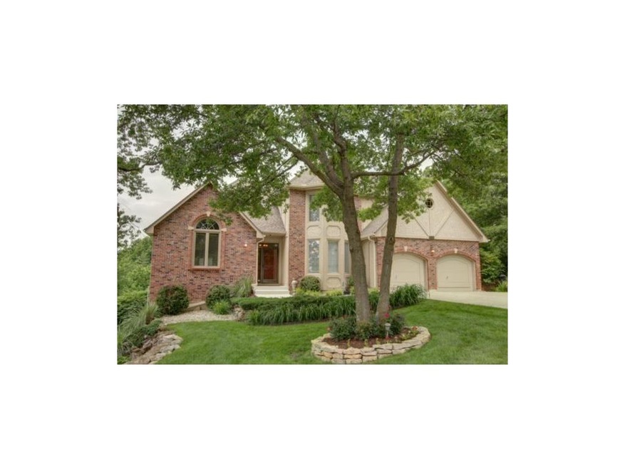 Brick trim and beautiful landscaping