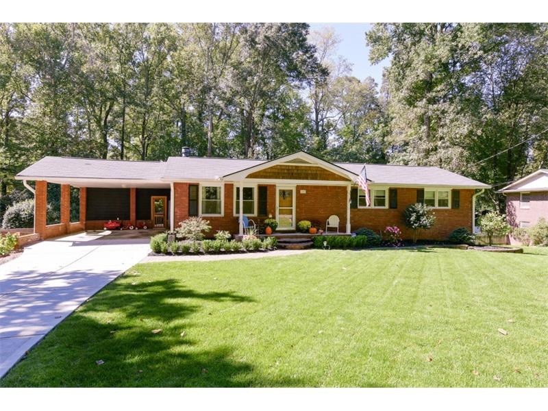 Welcome home! TOTALLY renovated, 4-sided brick RAN