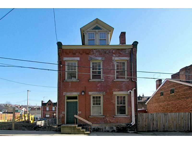 Exterior Front. 839 Concord St in Historic Deutsch