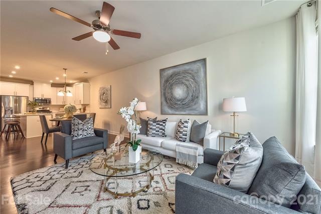 Kitchen is open to dining area and living room.