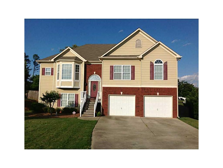 Exterior Front. Brick and Concrete Siding