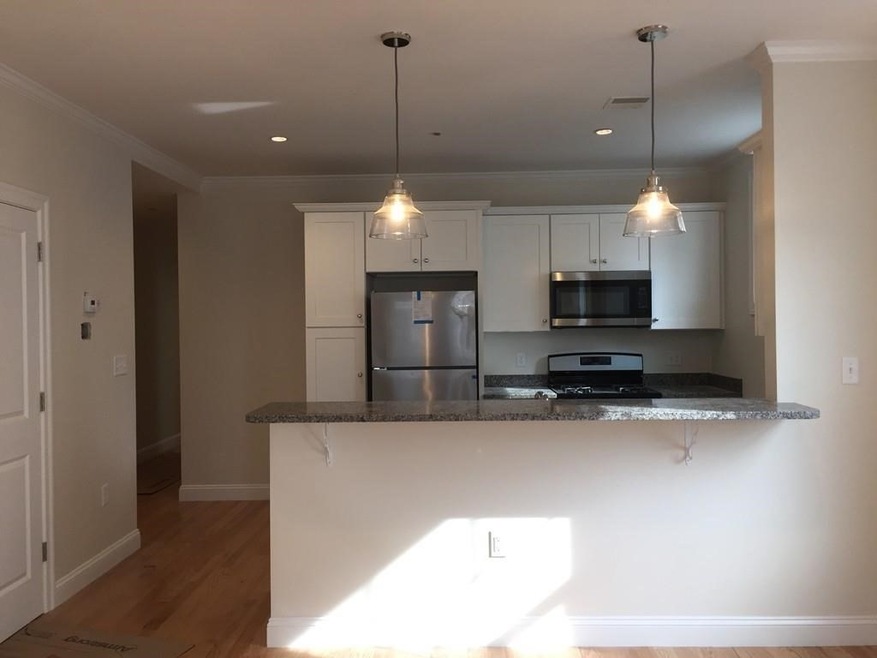 261 Lexington St unit 2, Boston, MA 02128 - photo 1