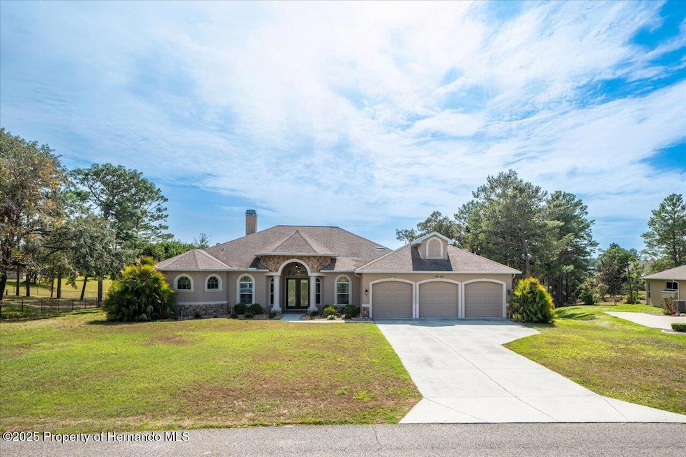 10188 Whisper Ridge Trail, Weeki Wachee, FL 34613 - photo 1