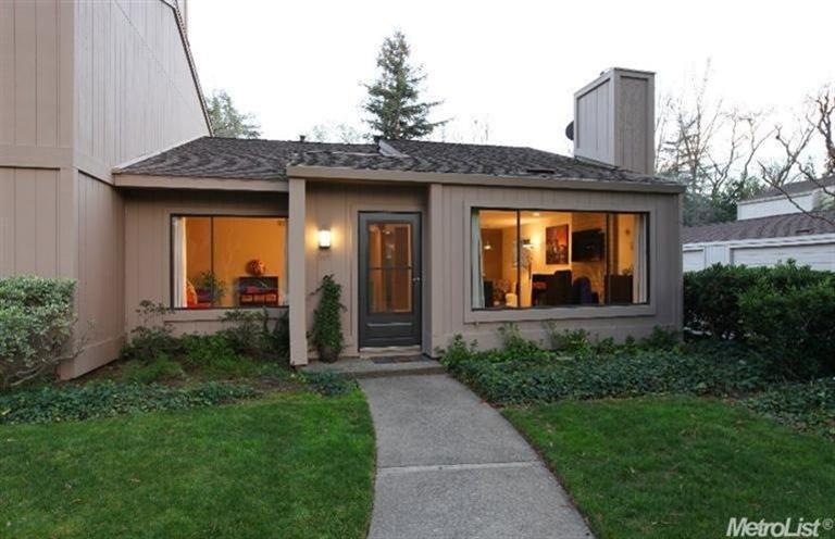 This charming one story is nestled amongst the bea