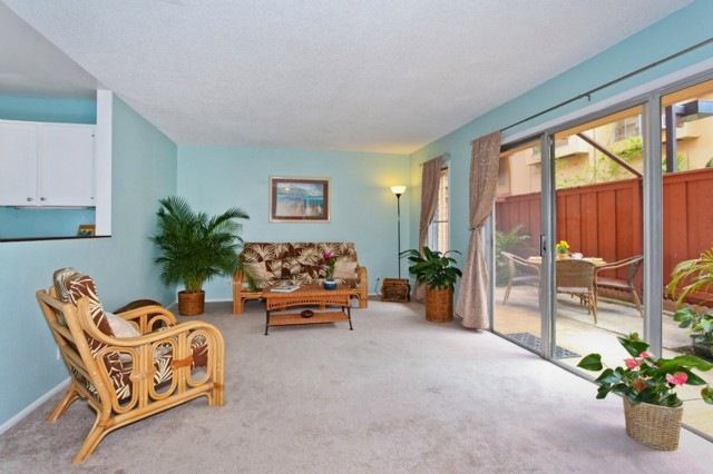 Spacious convenient living room with access to kit