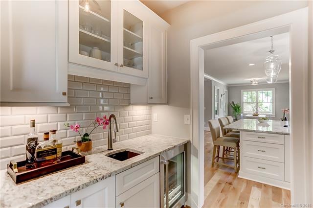 A lovely butler's pantry with built-in wine fridge