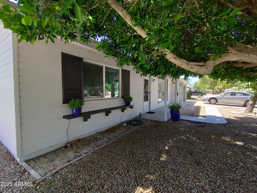 Outside front entry flower pot view