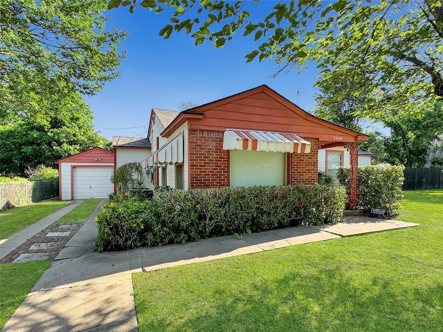 View of front of home featuring a garage, a front 