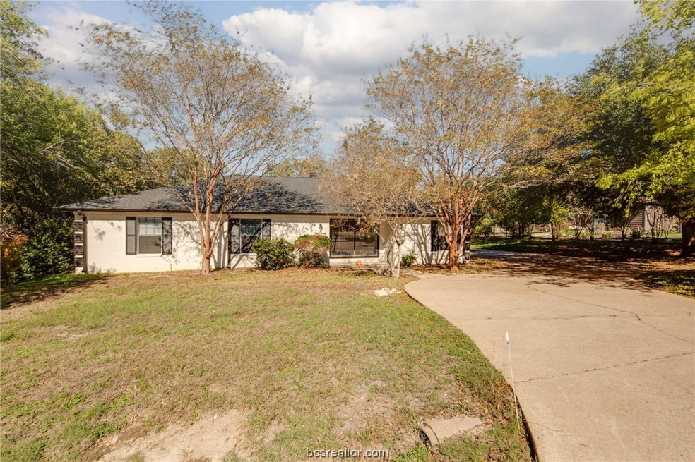 Front Elevation w/long driveway