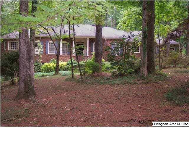 Beautiful full brick home on private, wooded, esta