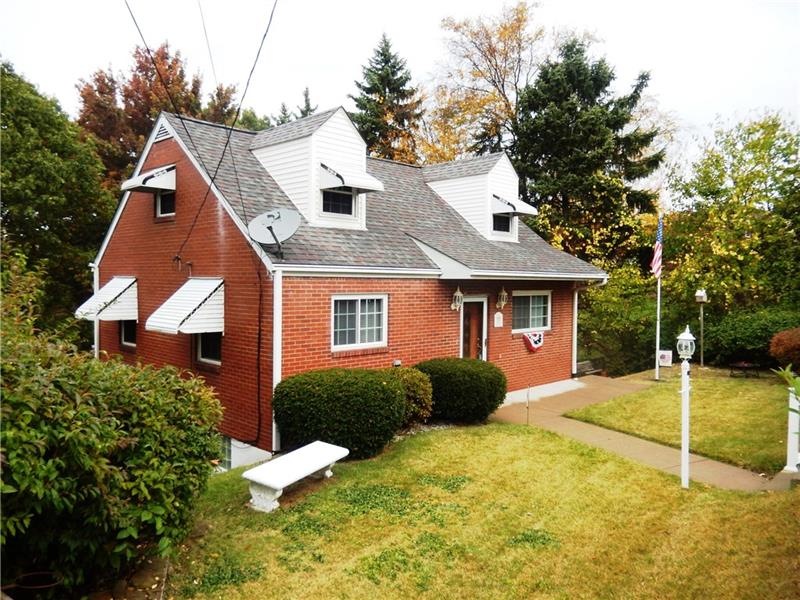 PRICE REDUCED!!!UPDATED solid brick cape cod. Larg