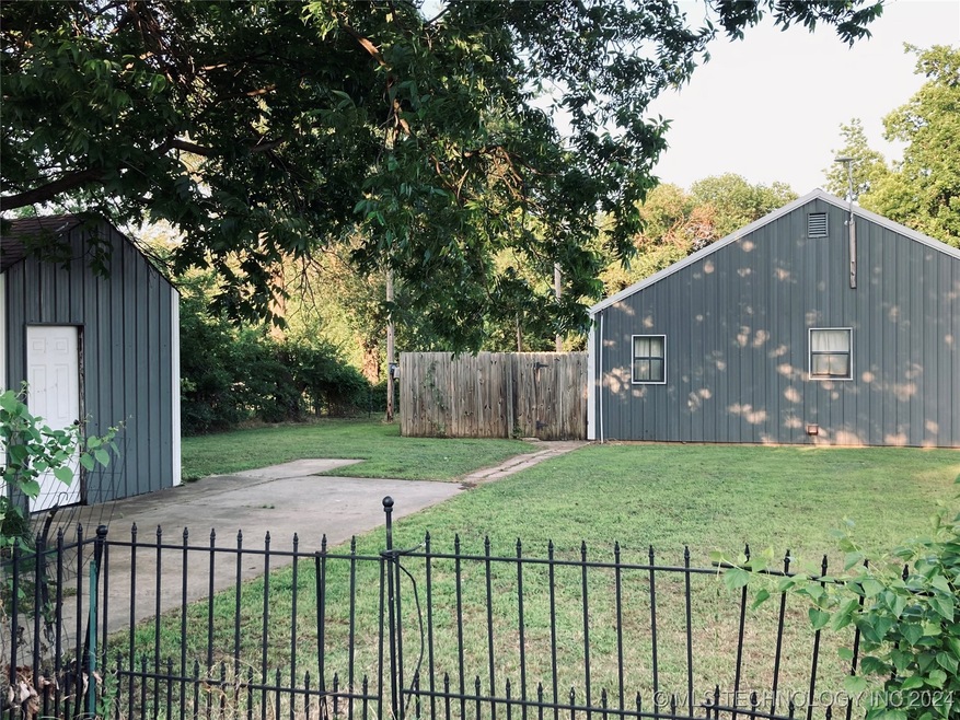 102 W Cypress St, Cushing, OK 74023 - photo 1