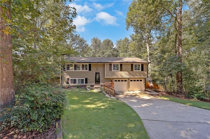 1309 Oakcrest Ct SW, Lilburn, GA 30047 - photo 1