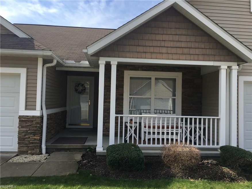 Front Elevation with stone and shake siding