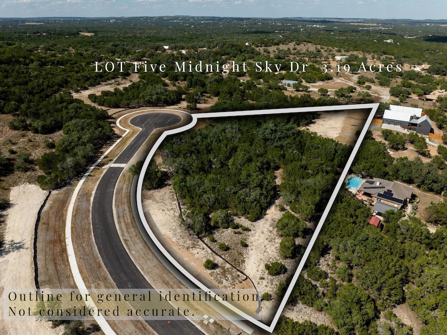 Aerial overview of property's location with property parcel outlined