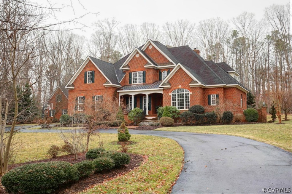 Welcome to 12615 Heather Grove Road. Circular driv