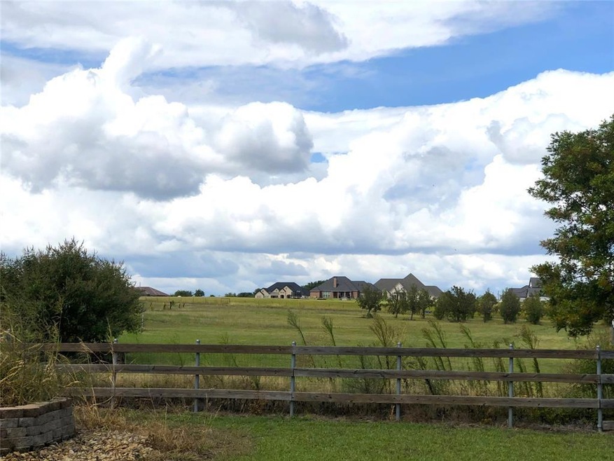 Large-lot luxury homes to the north of the property