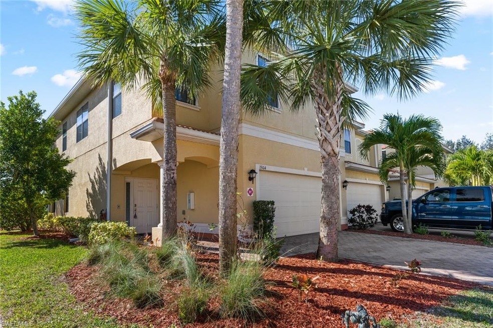 End unit with beautiful landscaping