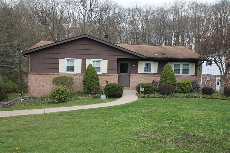 front of home with nice level yard.