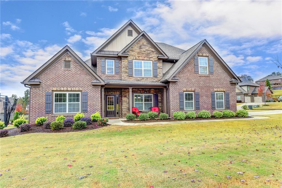 4 sided brick home with some stone accents and irr